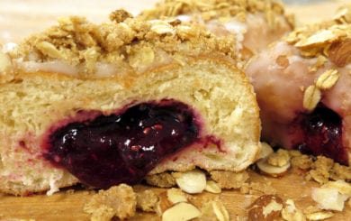 ABCD Donut – Our brioche donut is filled with house made our American berry filling of raspberries, blueberries, blackberries, and cherries, then topped with vanilla glaze and our signature crumb pie topping. 
