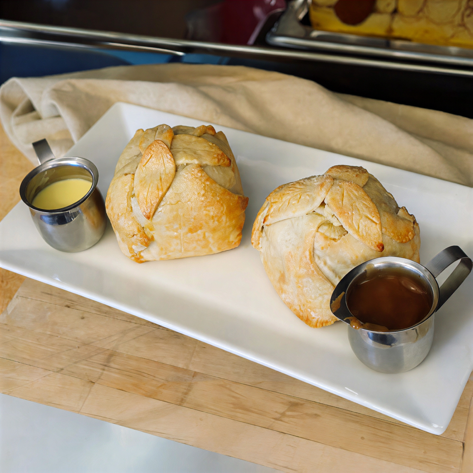 Golden baked apple dumplings made in a CRUST baking class